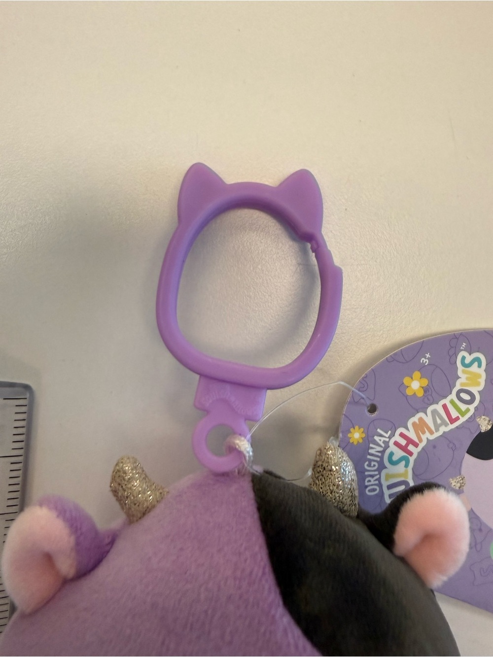 NWT 4 inch Alexie the Cow Squishmallow Purple Easter Clip-On Plush Toy - Picture 4 of 4